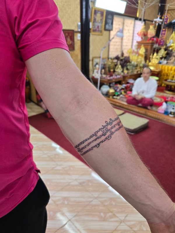 Sacred bracelet on forearm